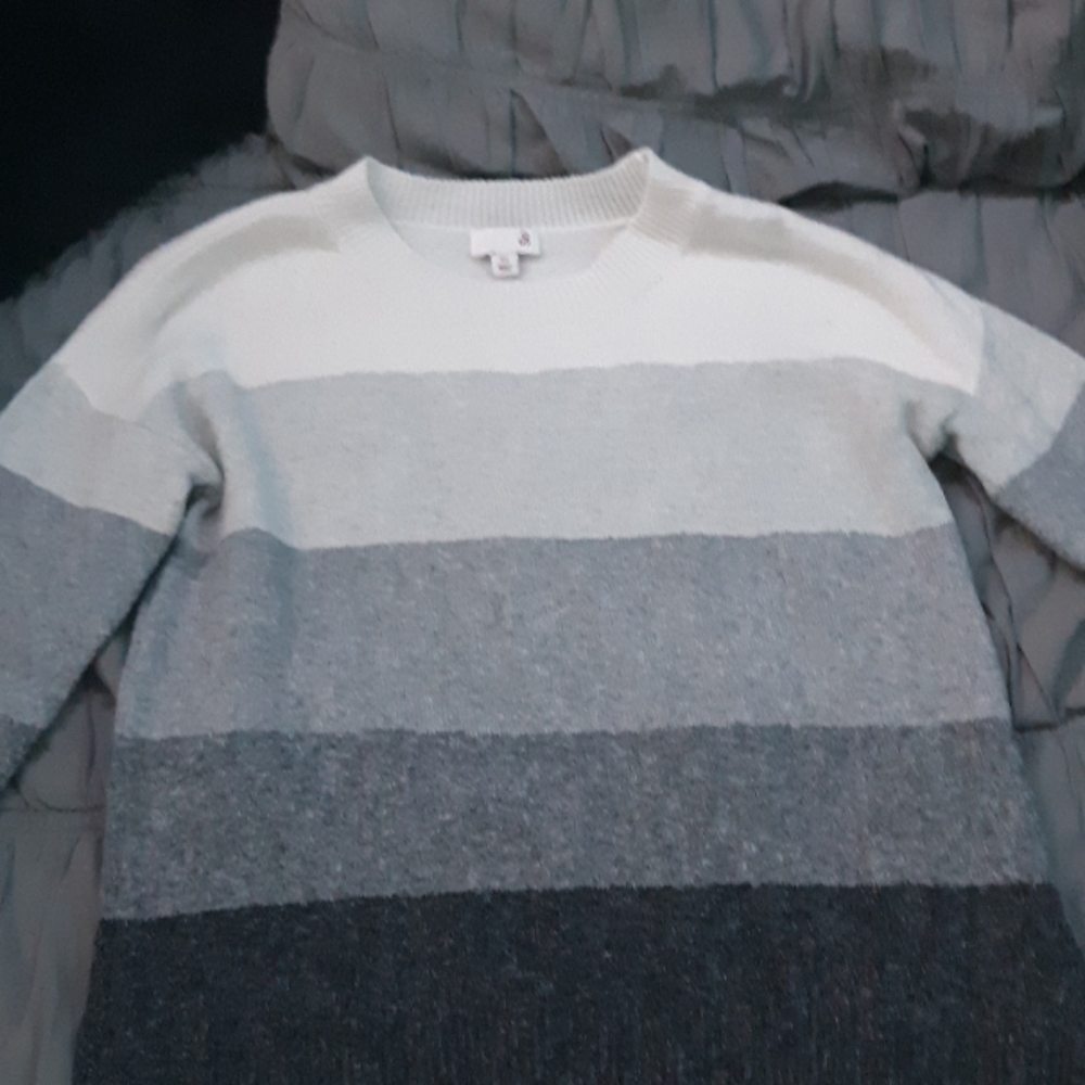 It's a So shirt in a extra small